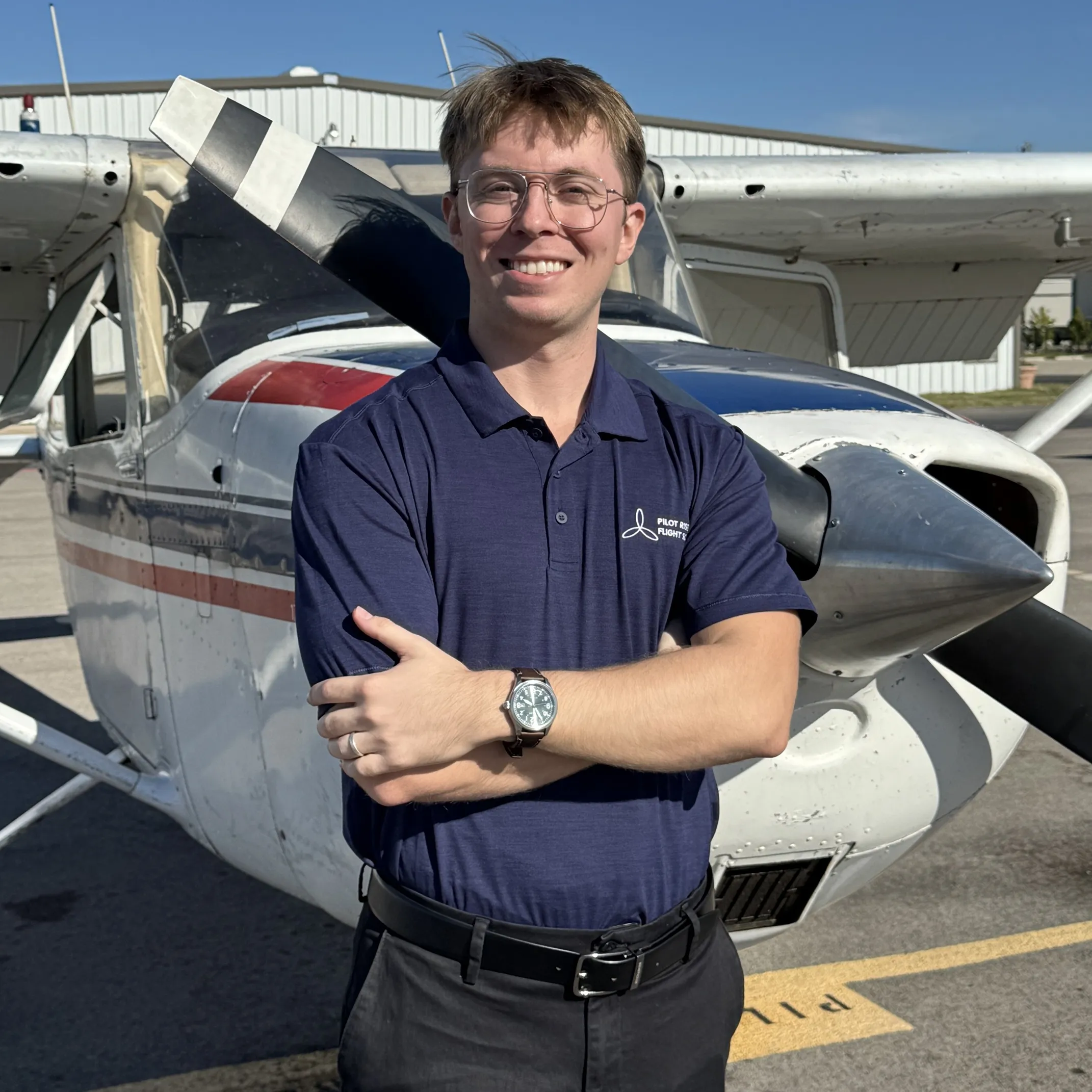 David Craven, Pilot Rise flight instructor, standing in front of a Cessna