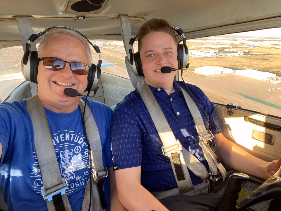 Michael Forseth flying with his father