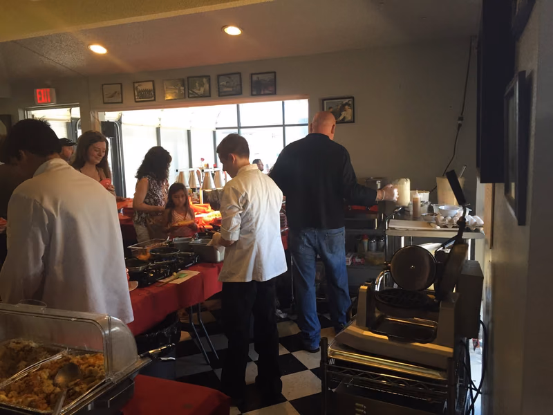 Michael Forseth working a breakfast shift at the Beacon Cafe at Hicks Airfield