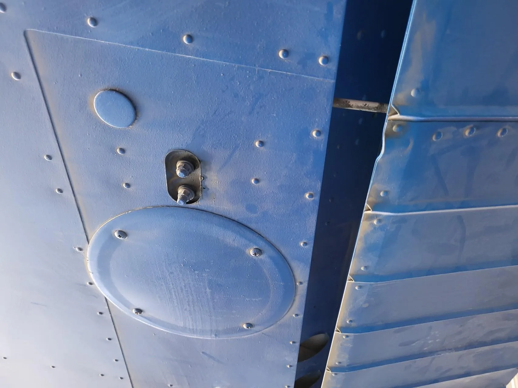 Additional aileron hinge and attachment hardware