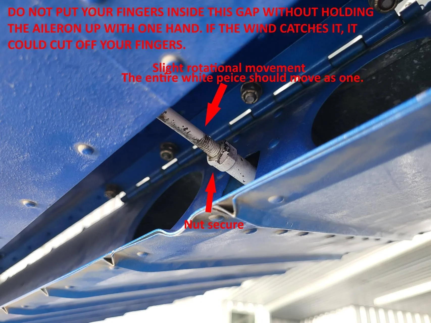 Aileron control rod and lock nut