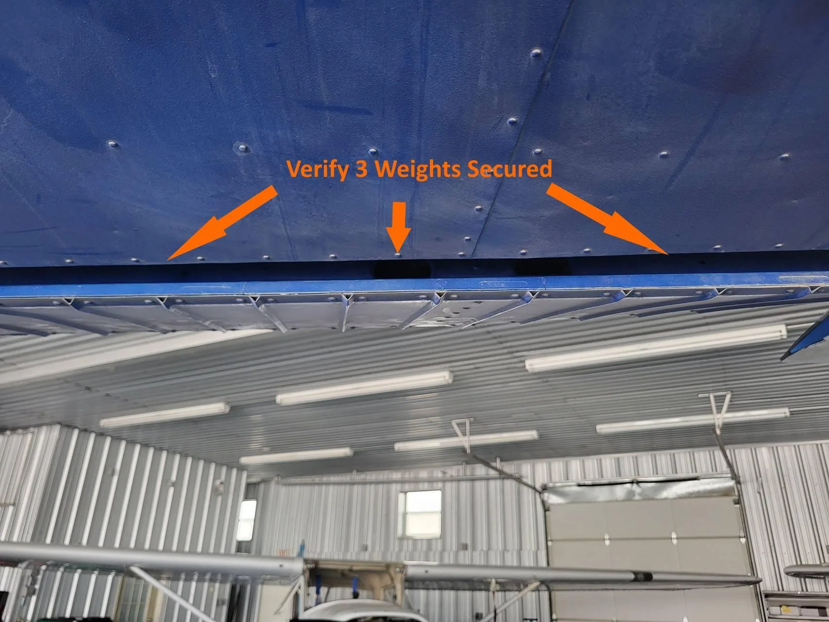 Aileron counterbalance weights
