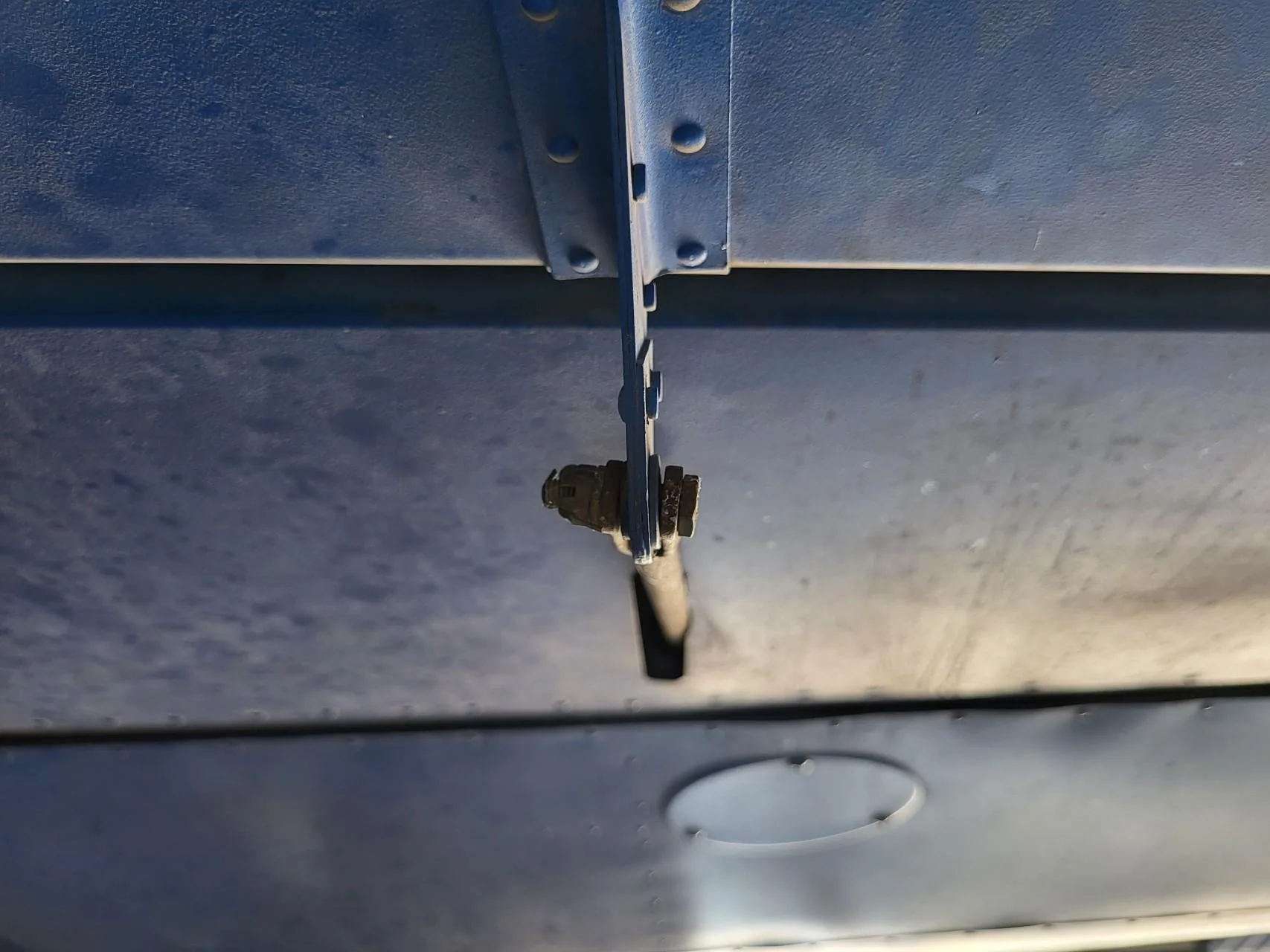 Trim tab connection hardware